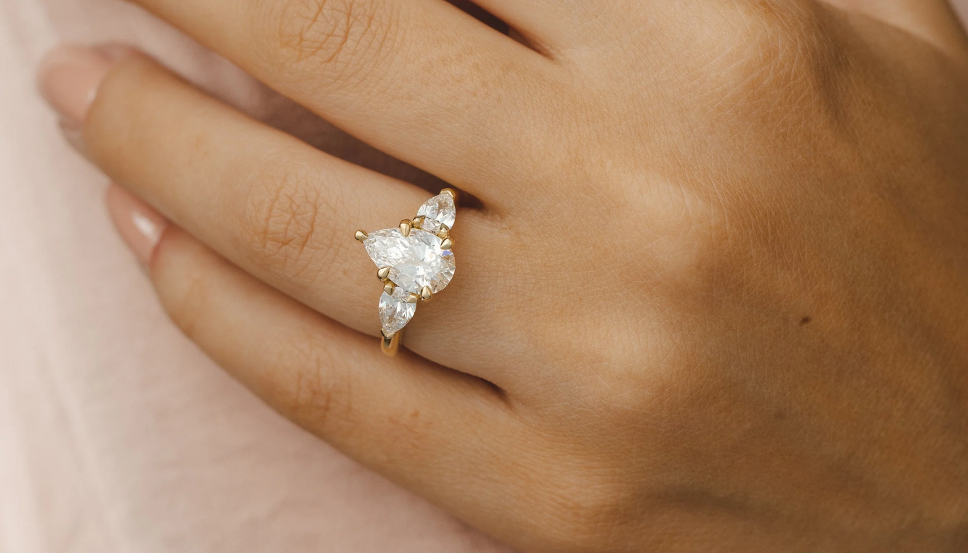 Master the Curve with a Pear Shape Rings