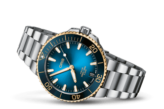 Aquis Date Calibre 400
 01 400 7769 6355-07 8 22 09Peb