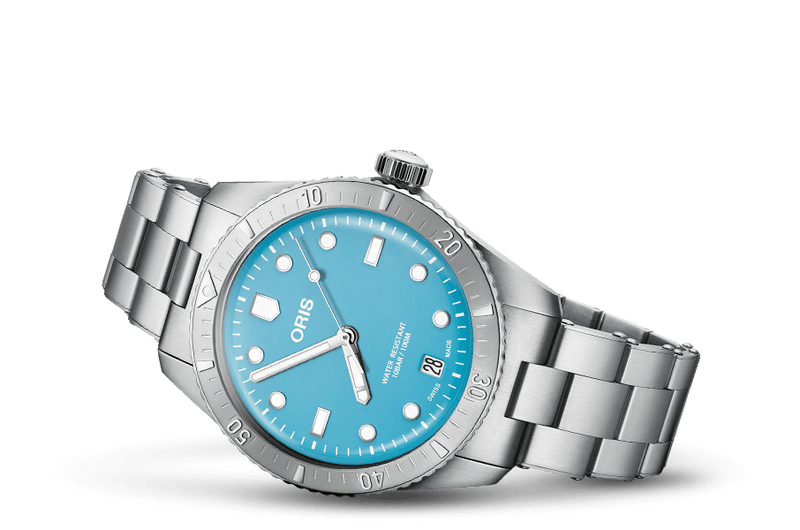 A stainless steel divers watch with a blue dial and strap, featuring a date display and multiple sub-dials.