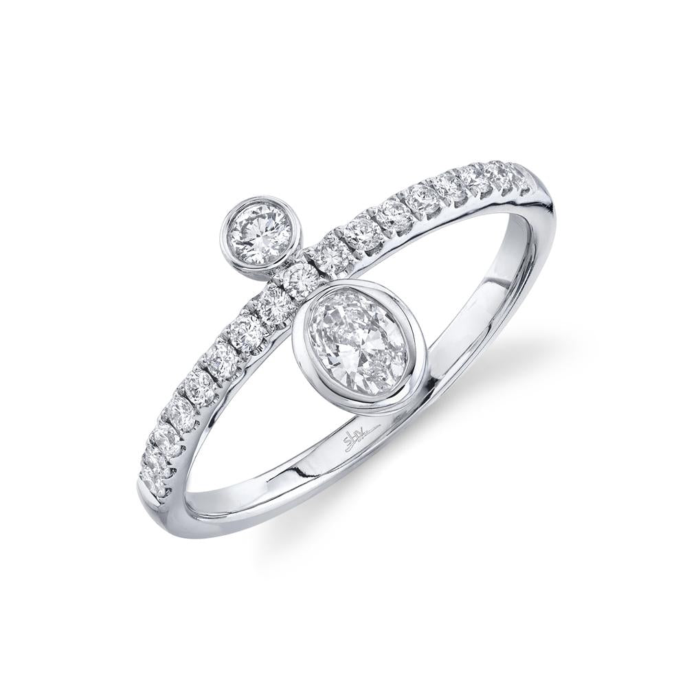 0.44CT DIAMOND OVAL BEZEL RING