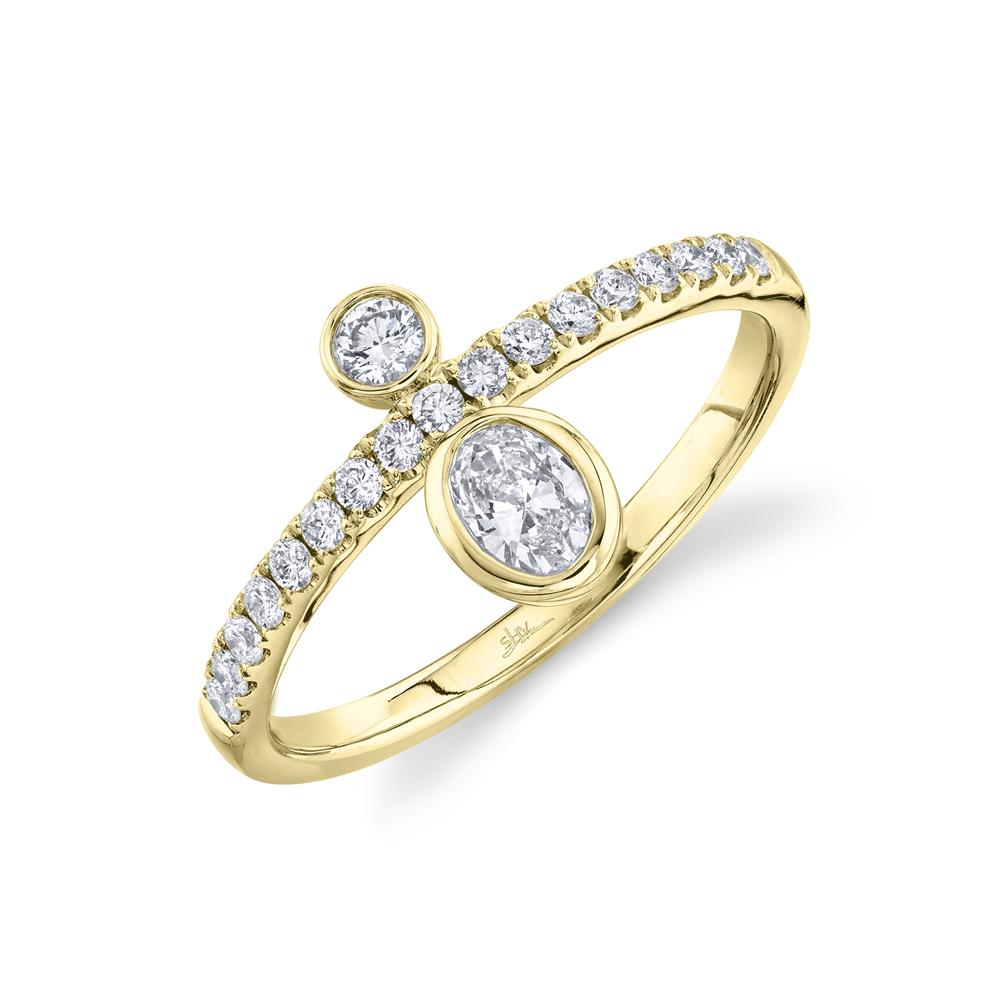 0.44CT DIAMOND OVAL BEZEL RING