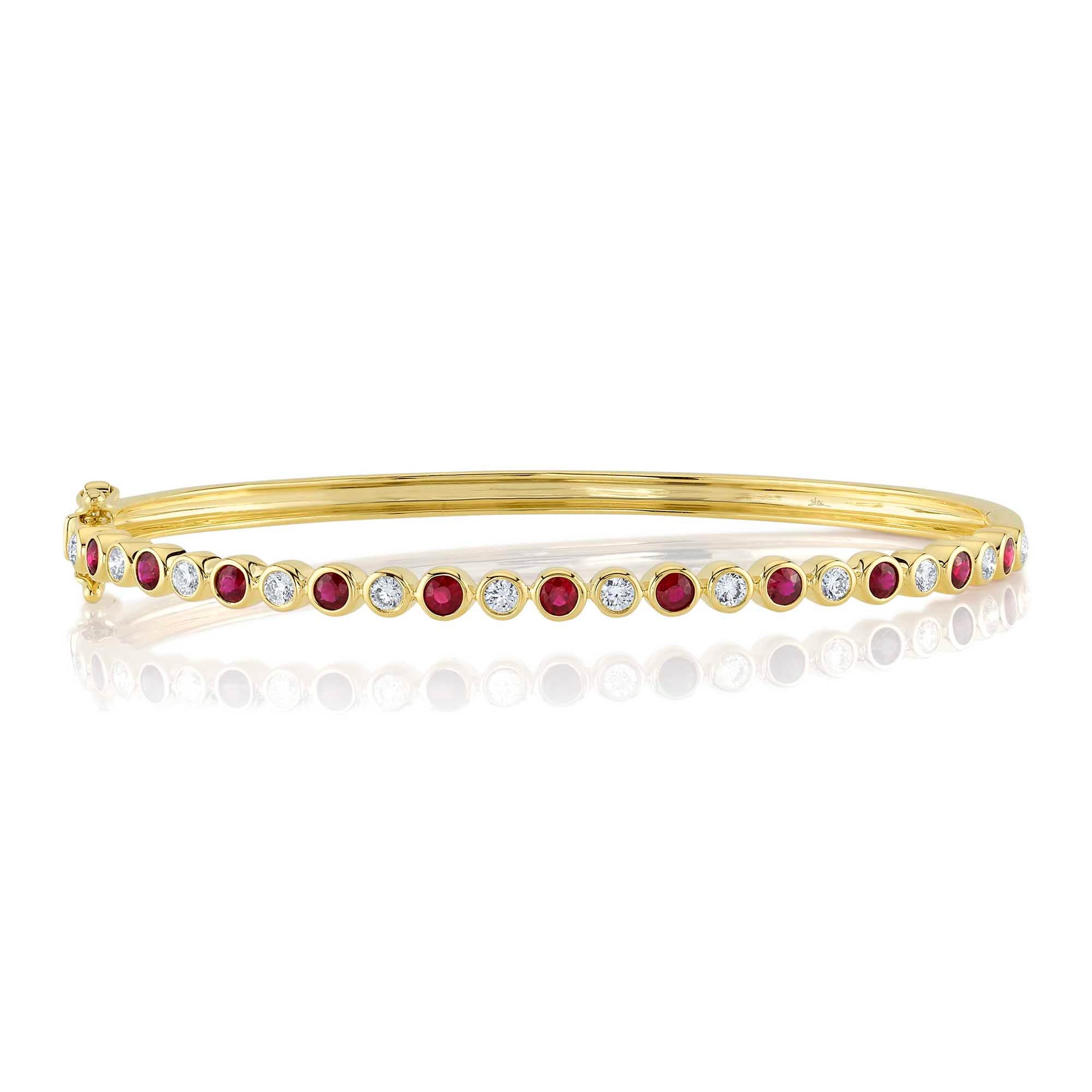 0.49CT DIAMOND & 0.75CT RUBY BEZEL BANGLE