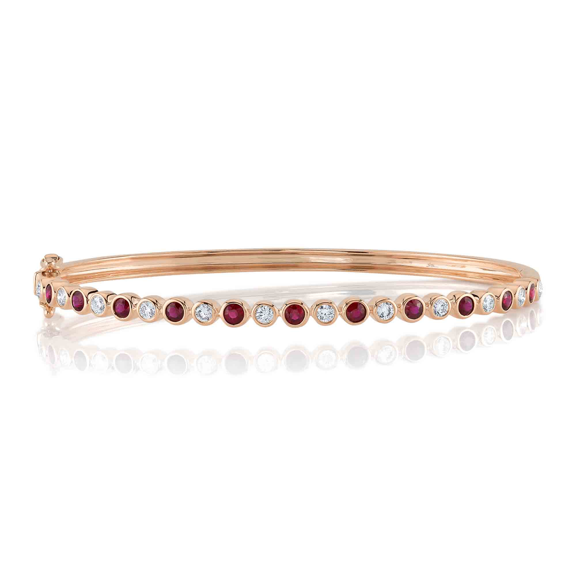 0.49CT DIAMOND & 0.75CT RUBY BEZEL BANGLE