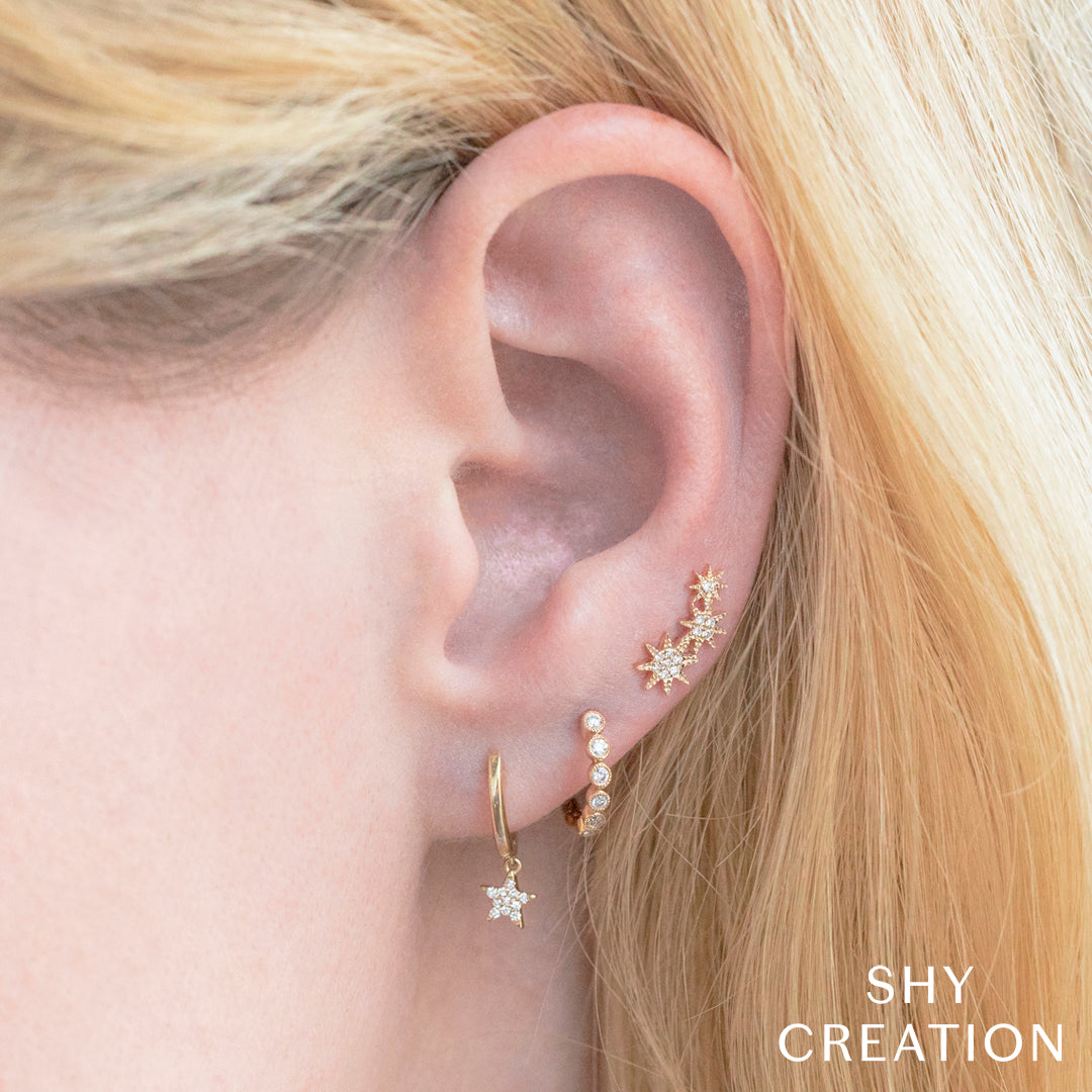 celeste-0-06-ct-diamond-star-crawler-stud-earring