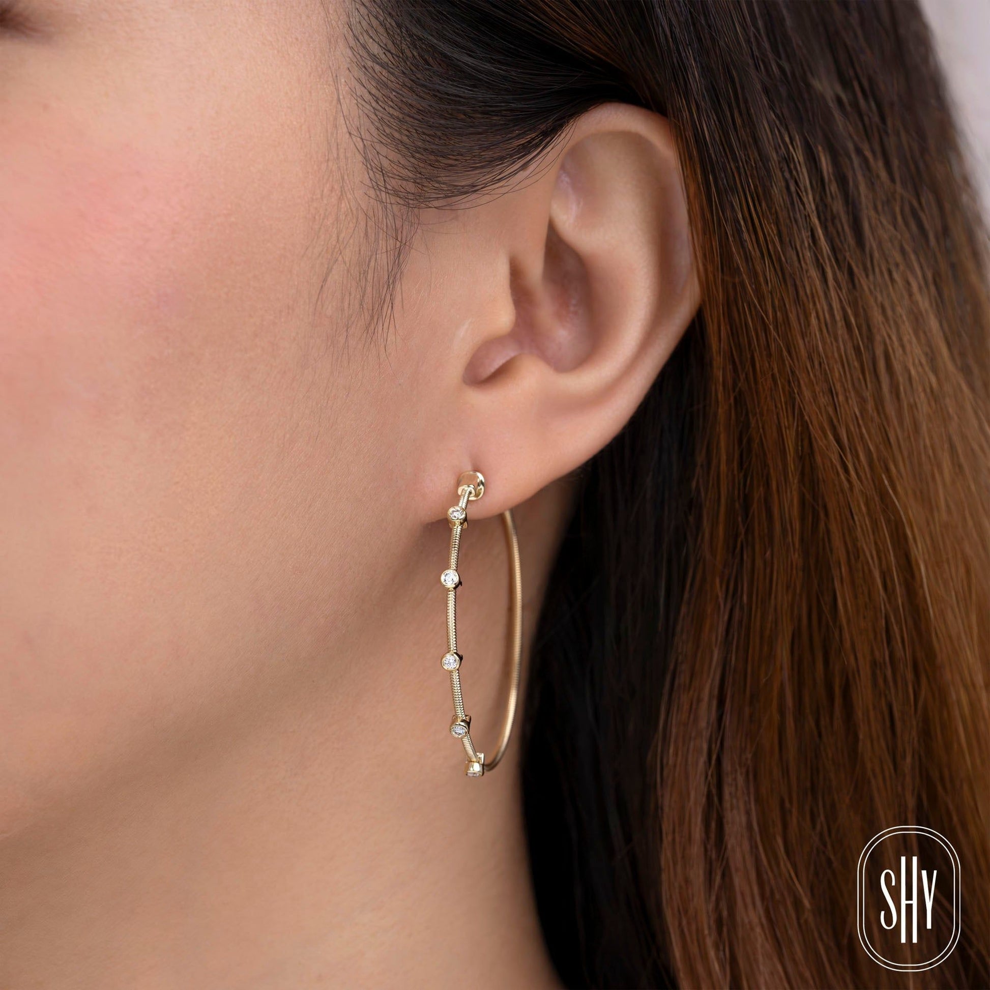0-27ct-diamond-bezel-hoop-earring