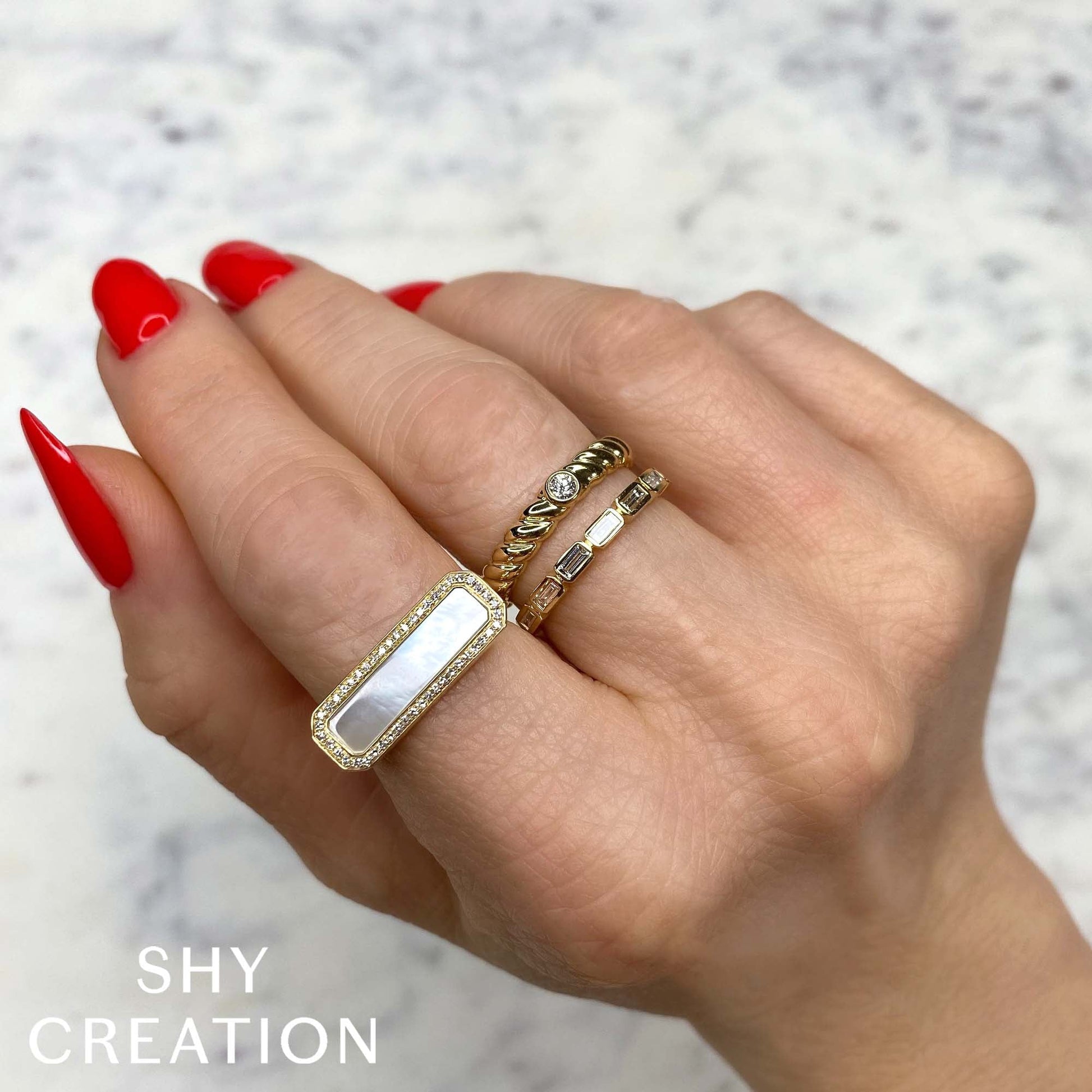 0-11ct-diamond-1-05ct-mother-of-pearl-bar-ring