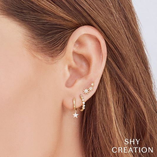 celeste-0-06-ct-diamond-star-crawler-stud-earring-1