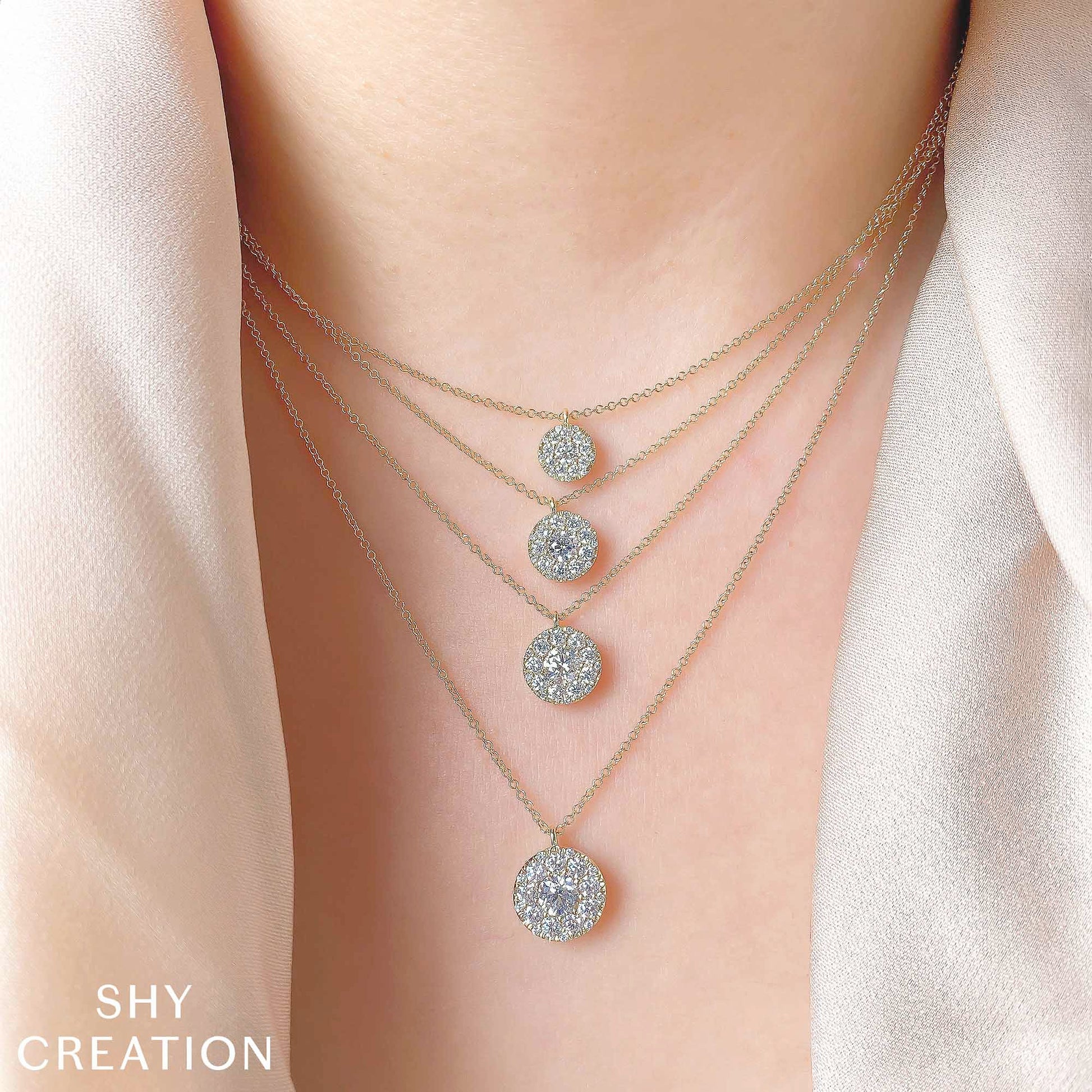 0-22ct-ctrround-0-28ct-side-diamond-cluster-necklace