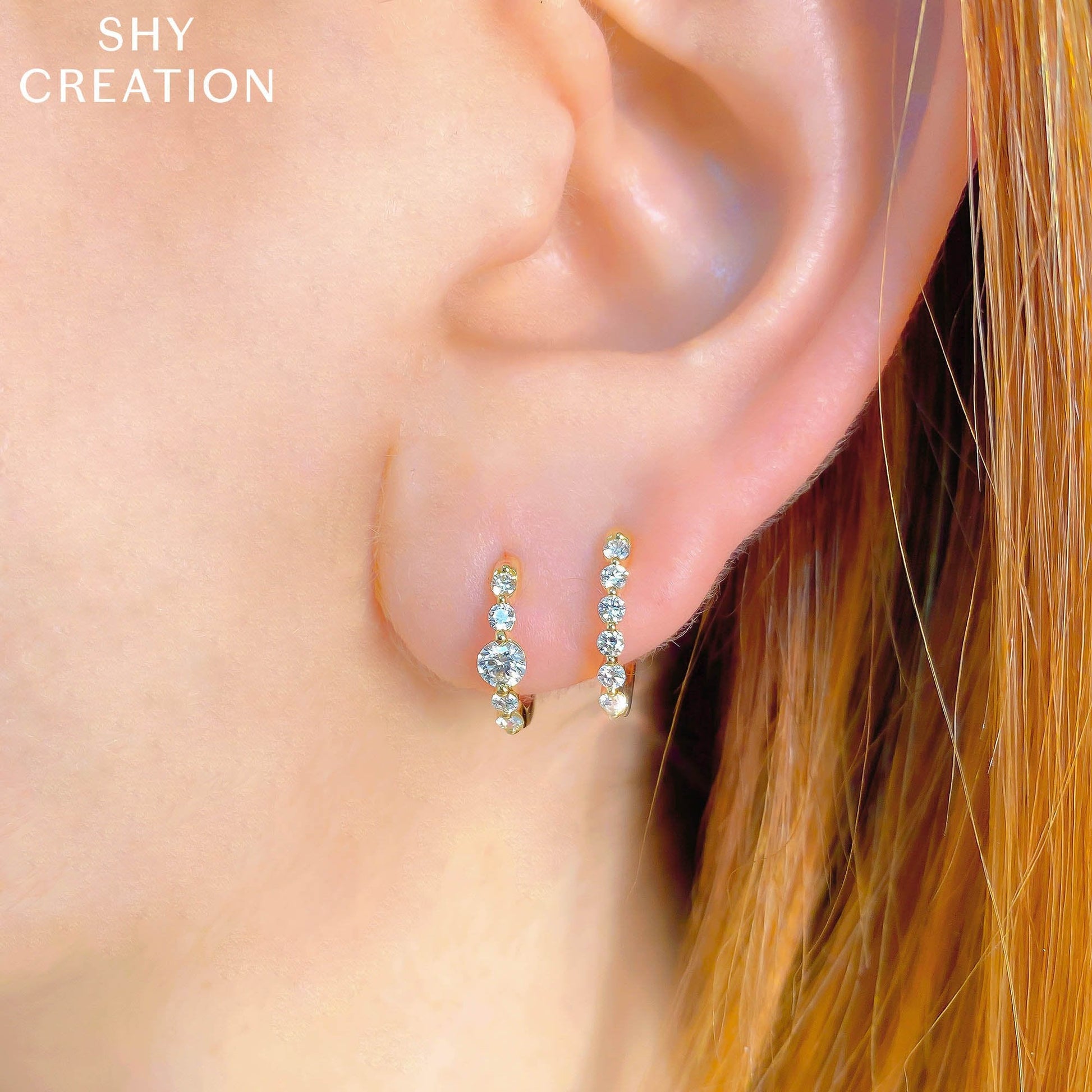 0-26ct-diamond-oval-huggie-earring-1