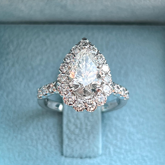 One-of-One Pear Brilliant Diamond Ring w/ Halo & Round Brilliant Side Diamonds